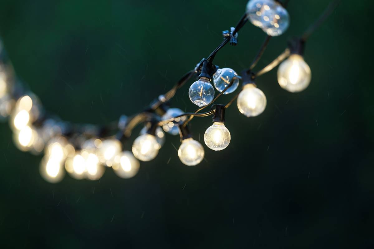 festive decor event lighting fixture that creates warm ambient glow in backyard party setting